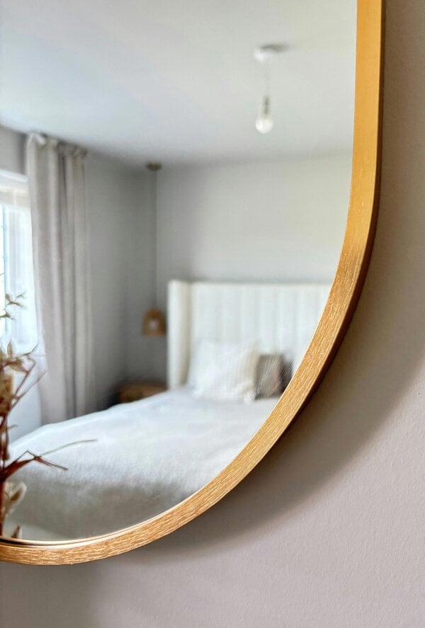 Downton Interiors Gold Modern Metal Frame Oval Wall Mirror - 70cm