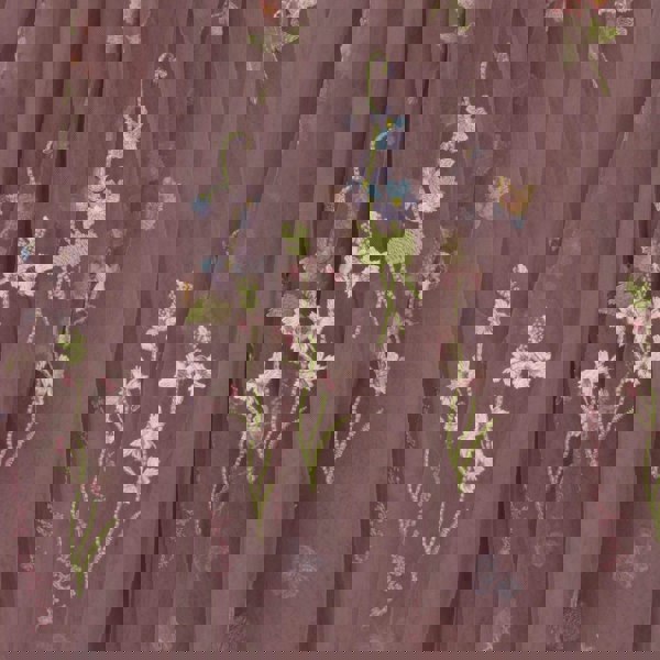 Embroidered floral design on a sheer fabric background