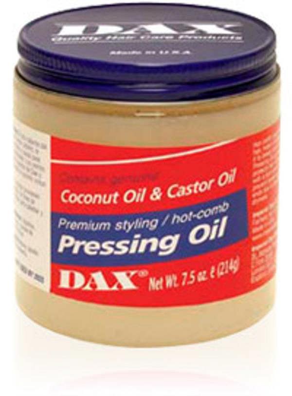 Jar of DAX Pressing Oil with coconut oil and castor oil on a white background