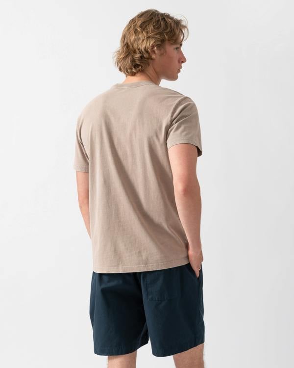 back shot of a model wearing a Colorful Standard Classic Organic T-Shirt in Faded Khaki