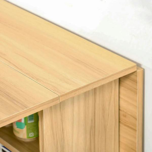 Teak table edge close-up with drop-leaf panel and side storage opening