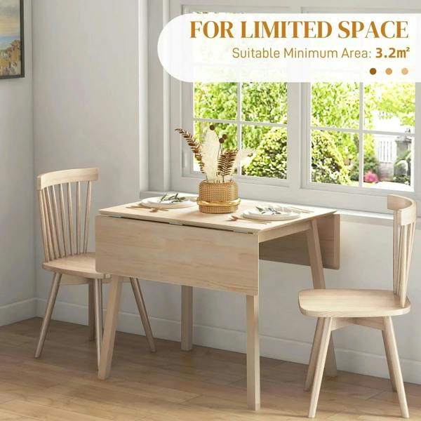 Natural wood drop-leaf dining table with expanded leaves in a compact dining area