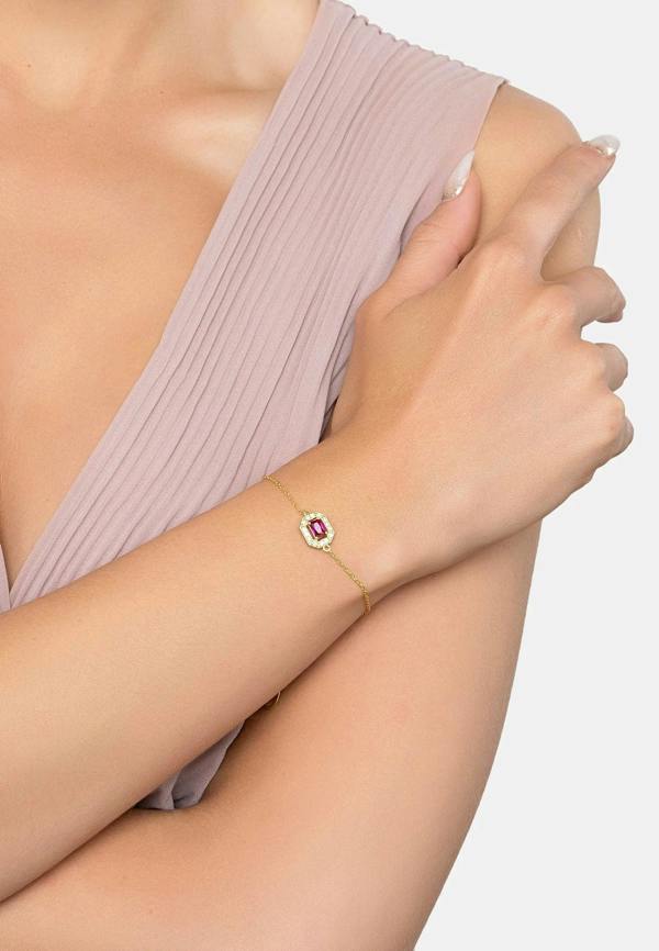 The bracelet worn by a model.