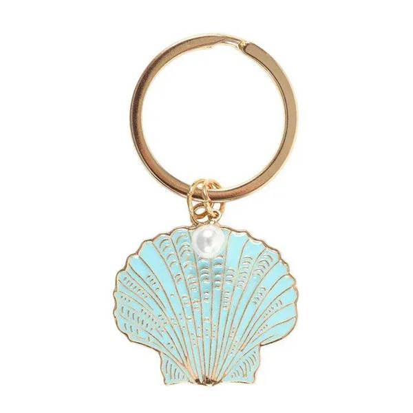 Gold-tone keyring with turquoise enamel seashell charm and white pearl