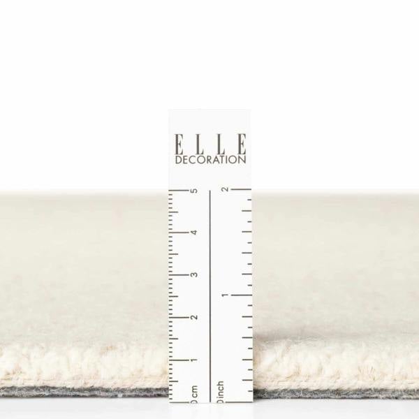 Fine Boucle Wool Rug Knots Natural White sound-absorbing, durable pile.