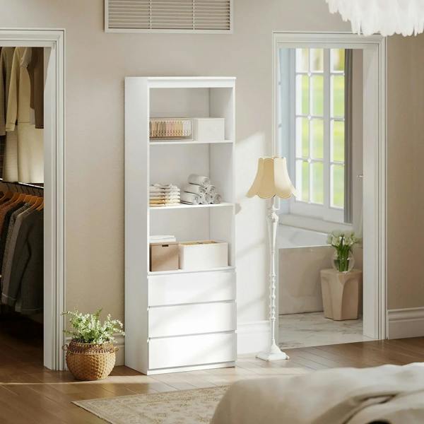 White bookcase with open shelves and drawers, placed near a doorway.