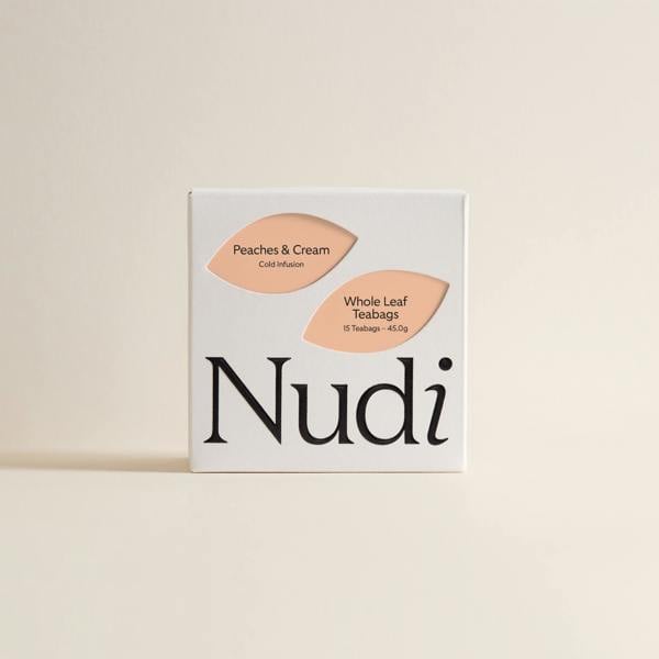 Nuditea peaches & cream luxury tea box with pastel peach leaves creating a clean & modern look.