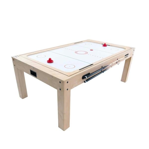 7-In-1 oak games table featuring a smooth white surface, red air hockey pucks, and sturdy wooden legs for durability and style