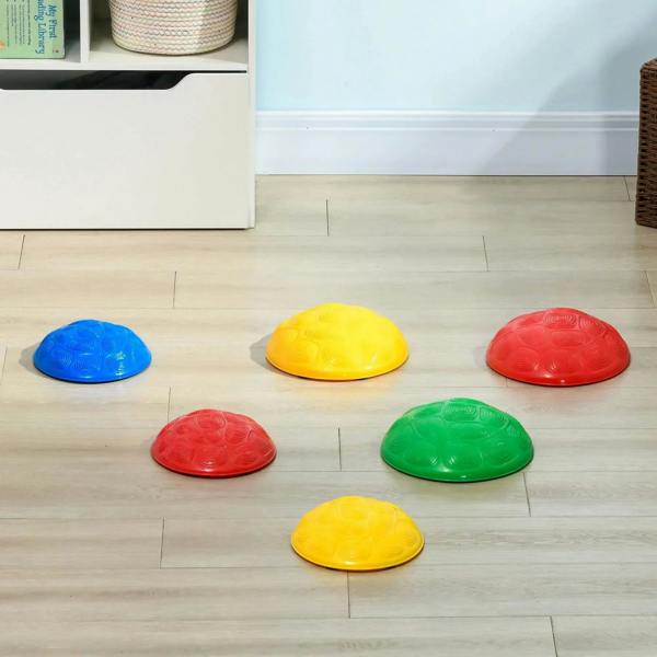 Six colorful non-slip stepping stones for kids arranged on light wood floor