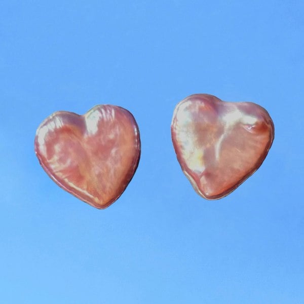 Baroque pearls shaped like hearts studs by LENAE London.