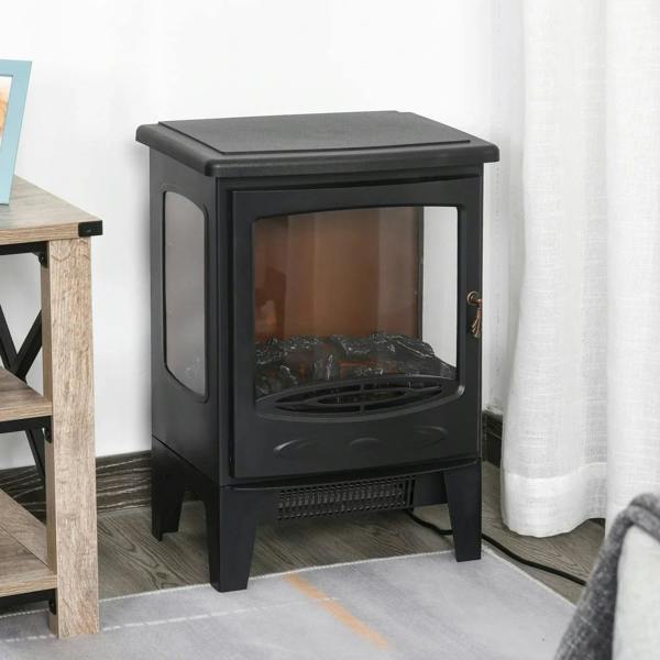 Black freestanding electric fireplace heater with enclosed glass front and faux log flame