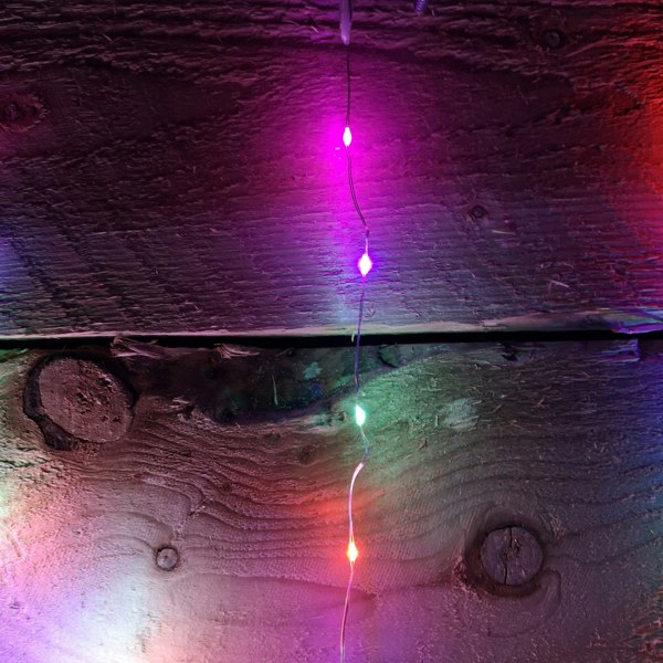 Samuel Alexander 1.2m Christmas Static Star LED Silver Pin Wire V Curtain Lights in Rainbow