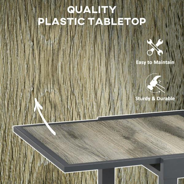 Grey woodgrain plastic tabletop on extending outdoor dining table, close-up edge