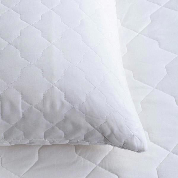Quilted Cotton Mattress & Pillow Protector Bundles - breathable, styled in a bedroom | Soak and Sleep
