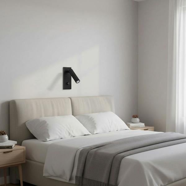 black dimmable reading lamp mounted over the bed in a modern bedroom 