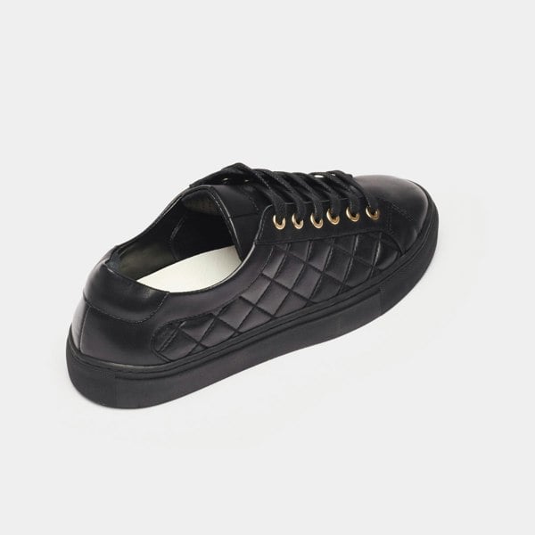 star black quilted trainer back view