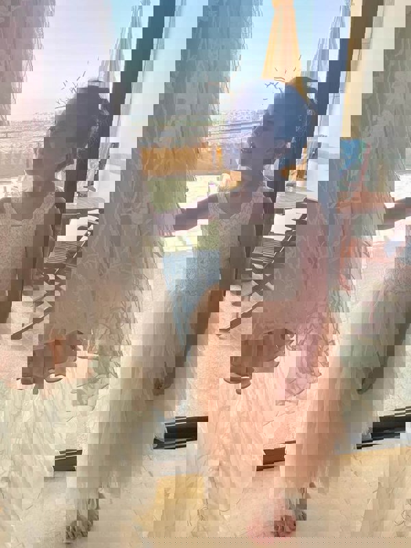 Young girl wearing pretty dress 