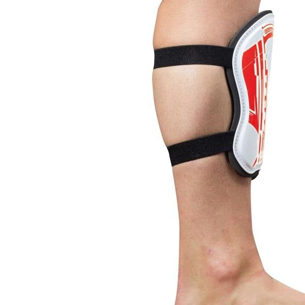 White and red Optimum Velocidade shin guard with two black elastic straps on lower leg, side view on white - Optimum