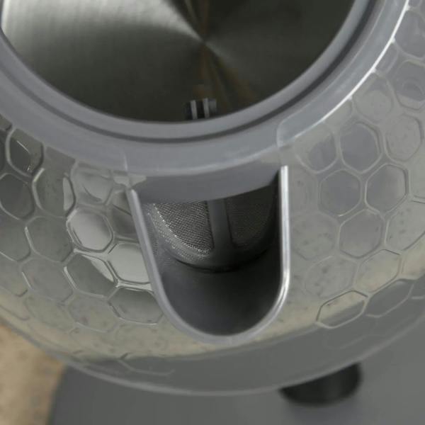Grey kettle base interior view with filter mesh at bottom