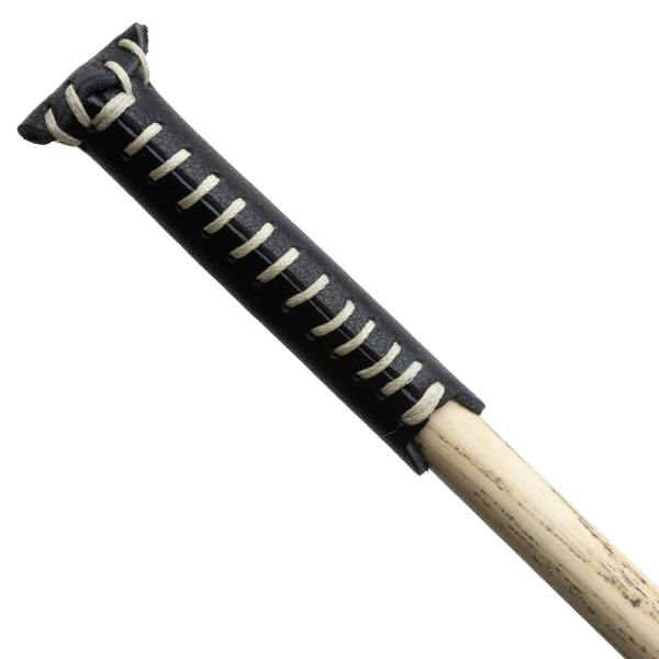 Leather tip protector fitted to a snooker cue tip