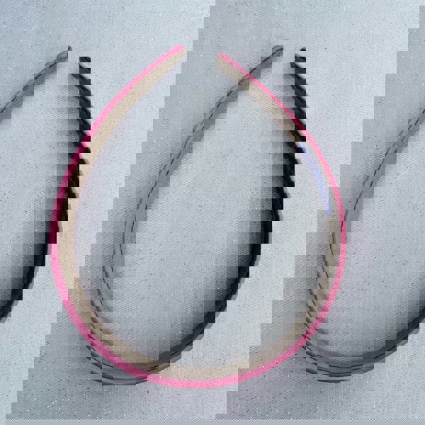 Pink hairband, smooth satin finish, soft padded design, bright pink colour, classic everyday accessory, stylish minimalist headband
