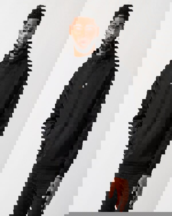 model wearing a HUGO Danovohood Mens Hoodie in Black