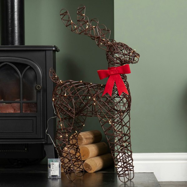 Samuel Alexander 60cm Battery Operated Light up Christmas Reindeer with Red Bow & Warm White LEDs