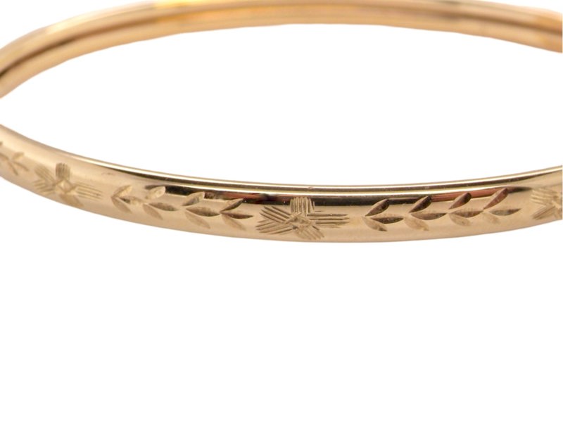 A modern gold bangle