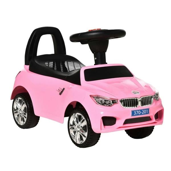 Pink ride-on toddler car with black steering handle and open seat