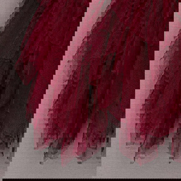 Close up of red ruffles from skirt