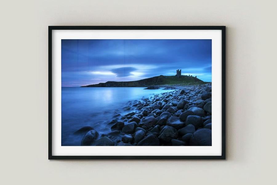 framed print of blue sunrise coastal seascape