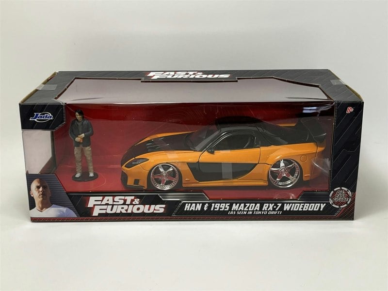 a toy car in a box
