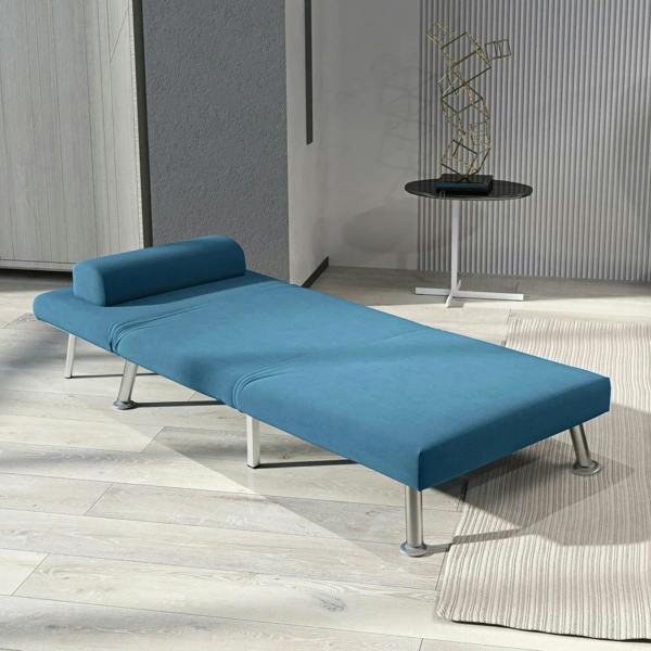Blue velvet-feel sleeper chair fully extended as a daybed with low backrest, silver legs