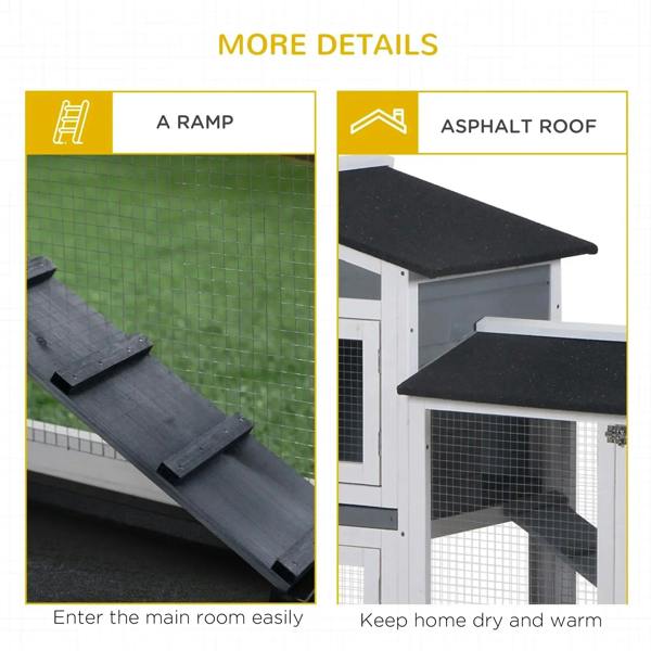 Grey rabbit hutch with black ramp and asphalt roof panels over mesh openings