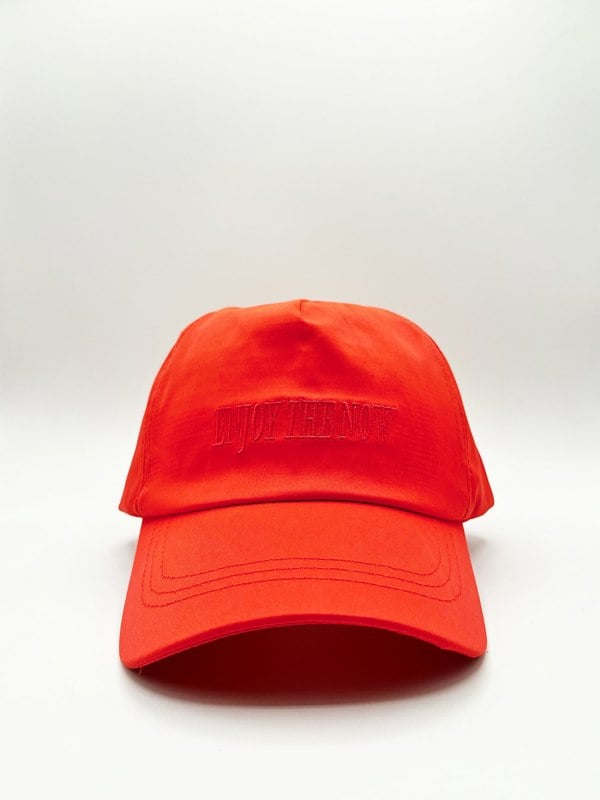 SVNX DARCIE Soft nylon 'enjoy the now' embroidered baseball cap in setting sun