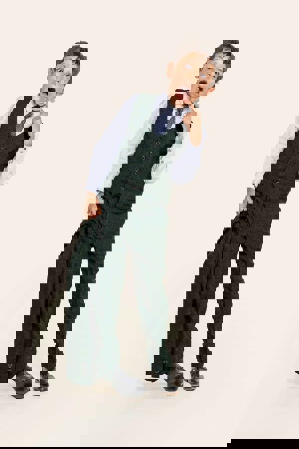 Young boy pulling faces modelling