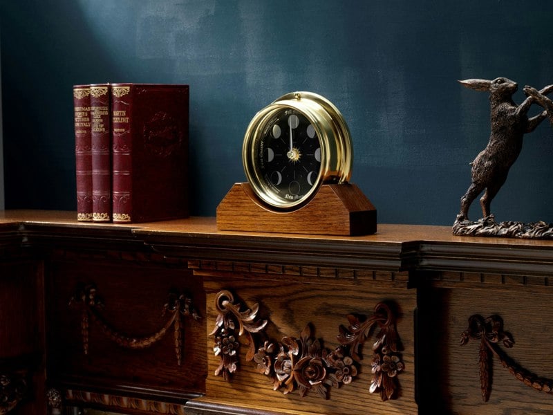 Prestige Brass Moon Phase Clock With a Jet Black Dial Mounted on a Solid English Dark Oak Mantel/Display Mount - TABIC CLOCKS