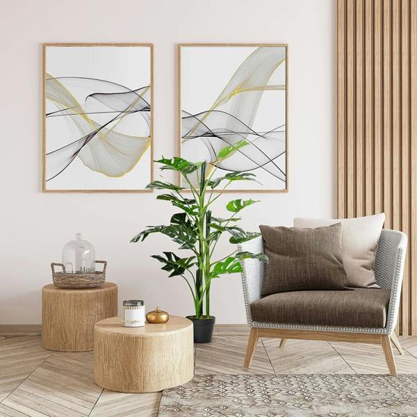Artificial monstera tree in black nursery pot
