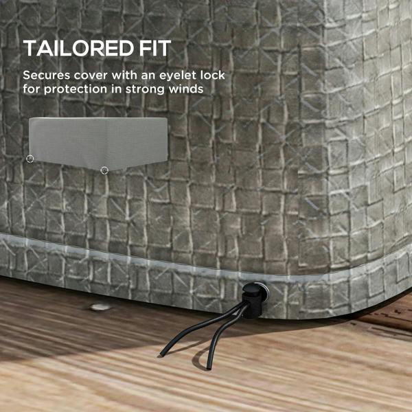 Tailored grey patio furniture cover with hem and fastening eyelet grommets.