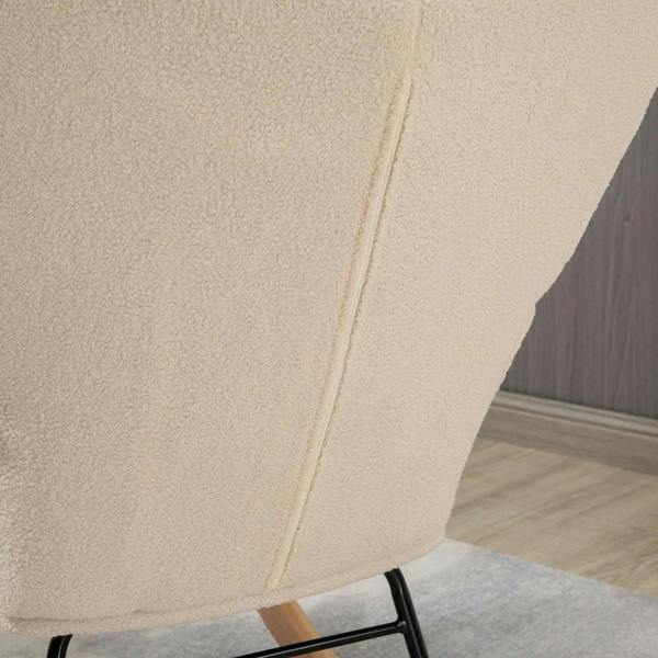 Beige fleece wingback chair backrest with stitched panel details