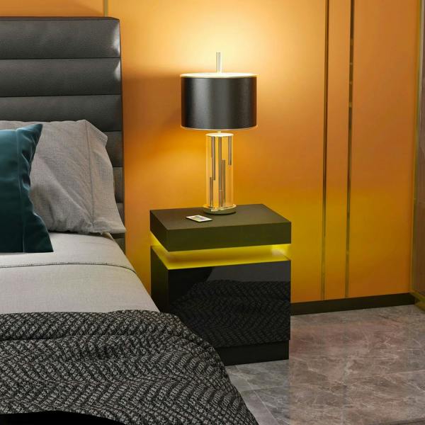 Black high-gloss LED bedside table with warm under-light and lamp on top