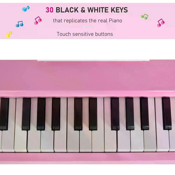 Pink mini kids piano keyboard with alternating white and black keys