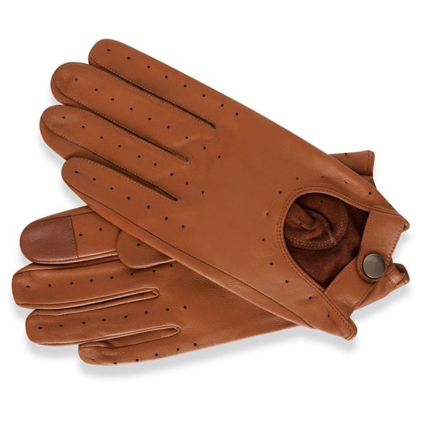 The image displays a pair of leather driving gloves which are tan in colour. The gloves are perforated with holes across the finger sleeves and cuff. The cuff also has a pop stud detail.