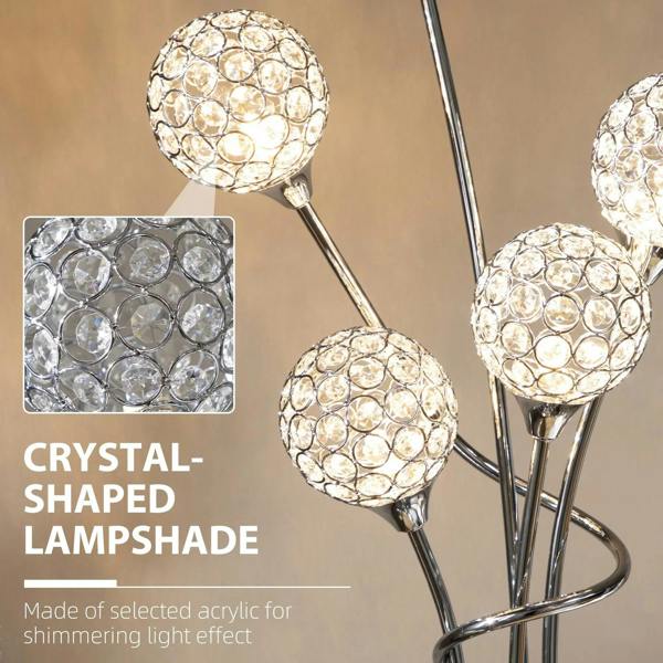 Crystal-shaped acrylic lampshade with circular pattern on a chrome pole