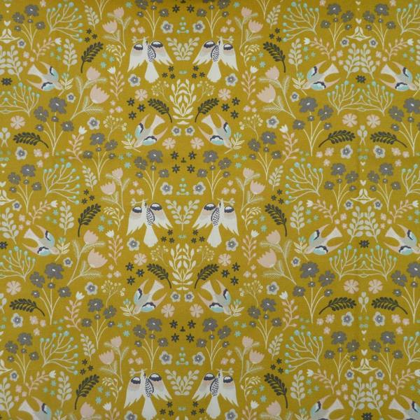 Folklore fabric close-up in Ochre