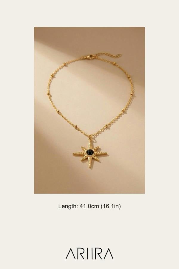 ARIIRA Gaia Gold Tone Starburst Pendant Necklace
