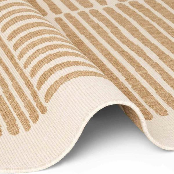 Close-up of a beige and white striped rug on a white background