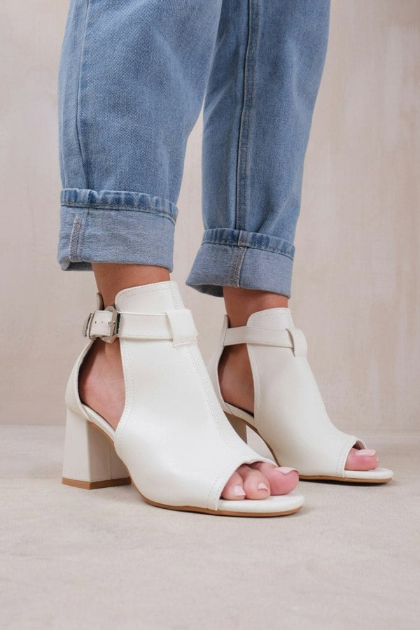 Where's That From Lisa Wide Fit Block Heel With Side Buckle and Open Toe Front in White Faux Leather