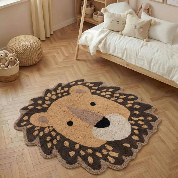 Children's room with a lion-shaped rug on a wooden floor, bed with pillows, and toys.