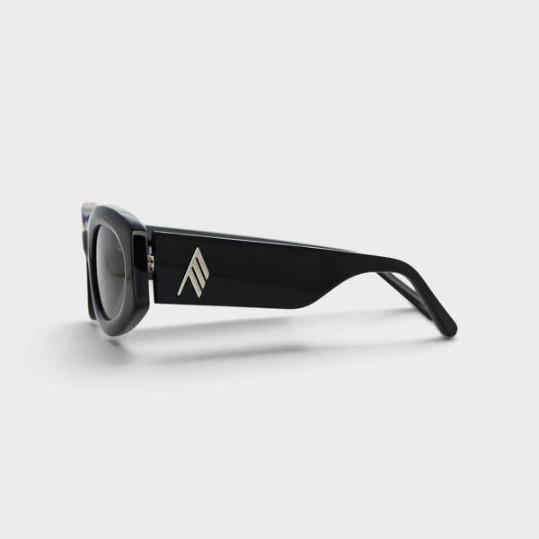 Supplied Fashion Linda Farrow Berta black sunglasses with a thick frame and silver logo detail on the temple
